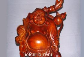 弥乐拎桃挑酒(黄花梨木雕